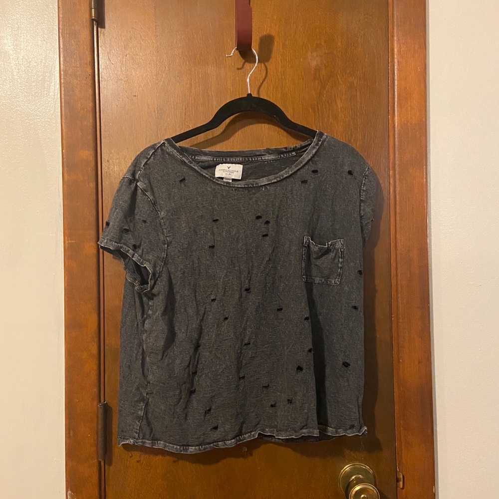 American eagle charcoal shirt with holes.